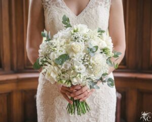 Home Elegant white rose and eucalyptus bridal bouquet designed by Natasha Coustol Floral Designs
