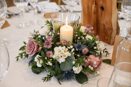 Chevin Country Park Hotel hurricane vase and candle floral centerpiece at the chevin country park hotel by natasha coustol floral designs