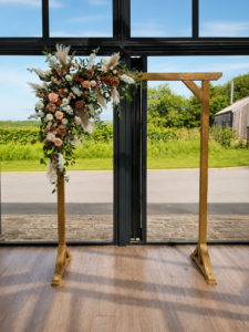 The Hovels, Harewood wooden wedding arch ceremony decor at the hovels at harewood